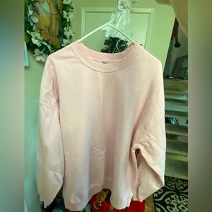 pink sweater very comfortable and warm inside for times with cold temperatures.